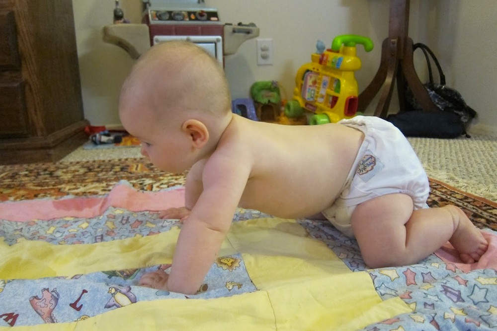 old fashioned cloth diapers and plastic pants